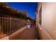 Fenced backyard with gravel and grill at 1557 Blue Sierra Ct, Henderson, NV 89074