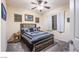 Comfortable bedroom featuring a plush bed, soft lighting, and neutral tones, creating a cozy and inviting atmosphere at 1557 Blue Sierra Ct, Henderson, NV 89074