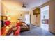 Spacious main bedroom with carpet floors, large bed, television and entry to the bathroom at 1557 Blue Sierra Ct, Henderson, NV 89074