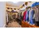 Spacious walk-in closet with ample shelving and hanging space for organized storage at 1557 Blue Sierra Ct, Henderson, NV 89074