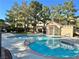 Community pool with an adjacent recreation area and plenty of seating at 1812 Warrenville St, Las Vegas, NV 89117