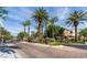 Gated community entrance with well-maintained landscaping and palm trees at 1812 Warrenville St, Las Vegas, NV 89117