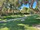 Scenic view of the community greenbelt with walking paths and lush landscaping at 1812 Warrenville St, Las Vegas, NV 89117