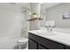 Bathroom with a shower-tub combo, plant shelf, and a modern-looking single sink vanity at 1922 Via Delle Arti, Henderson, NV 89044