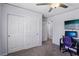 Bedroom featuring a large closet, desk setup, and modern design touches at 1922 Via Delle Arti, Henderson, NV 89044