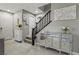 Inviting foyer featuring modern decor and staircase to the second floor at 1922 Via Delle Arti, Henderson, NV 89044