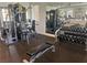 Well-equipped fitness center with weight machines, dumbbells, and treadmills promoting a healthy lifestyle at 1922 Via Delle Arti, Henderson, NV 89044