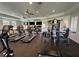 Well-equipped gym featuring treadmills and weight machines for a complete fitness experience at 1922 Via Delle Arti, Henderson, NV 89044
