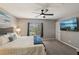 Cozy main bedroom with a large window and a flat screen television at 1922 Via Delle Arti, Henderson, NV 89044