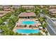 Overhead view of the community pool area, complete with lounge chairs and pergola-covered seating at 1922 Via Delle Arti, Henderson, NV 89044