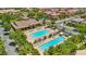 Bird's eye view of the community pool, featuring lounging areas and pergola for relaxation by the pool at 1922 Via Delle Arti, Henderson, NV 89044