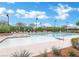 Inviting pool area featuring lounge chairs and umbrellas for relaxing by the water at 1922 Via Delle Arti, Henderson, NV 89044