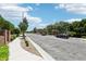 Peaceful street view with sidewalks, green landscaping and parked vehicles, creating a community feel at 1922 Via Delle Arti, Henderson, NV 89044
