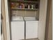 Laundry area with shelving above appliances at 2050 N Los Feliz St # 170, Las Vegas, NV 89156