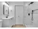 Clean and modern bathroom features a tiled shower with sleek black fixtures at 2105 Berkley Ave, Las Vegas, NV 89101