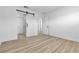 Bedroom with barn-style sliding door to bathroom and closet at 2105 Berkley Ave, Las Vegas, NV 89101