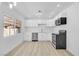 Well-lit kitchen features stainless steel appliances, sleek cabinets, and a functional layout for everyday cooking at 2105 Berkley Ave, Las Vegas, NV 89101