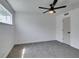 Bedroom with carpet and a ceiling fan for climate control and comfort at 212 View Dr, Las Vegas, NV 89107