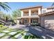 Spacious backyard with patio, perfect for outdoor entertaining and relaxation, featuring beautiful grass at 2285 Villefort Ct, Las Vegas, NV 89117
