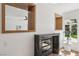 Dining room has modern fireplace, recessed lights and view to backyard at 2297 Aria Dr, Henderson, NV 89052