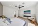 Inviting main bedroom features a modern fireplace, TV, and an ensuite bathroom at 2297 Aria Dr, Henderson, NV 89052