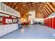 Expansive barn interior with high ceilings, storage, and rustic chandelier, perfect for events at 2770 La Casita Ave, Las Vegas, NV 89120