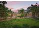 Expansive front lawn with palm trees highlights this house's front exterior at 2770 La Casita Ave, Las Vegas, NV 89120