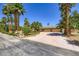 Beautiful home with a circular driveway, mature landscaping, and a sense of privacy at 2770 La Casita Ave, Las Vegas, NV 89120