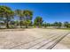 Spacious horse arena with white fencing, offering a premier equestrian space for riding and training at 2770 La Casita Ave, Las Vegas, NV 89120