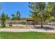 View of a horse property with a covered stable area in a well-maintained rural setting at 2770 La Casita Ave, Las Vegas, NV 89120