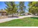 Horse property featuring lush grass, white fencing and shelters at 2770 La Casita Ave, Las Vegas, NV 89120