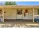 Exterior shot of horse stalls featuring a horse peering out of its stall at Sierra Vista Ranchos at 2770 La Casita Ave, Las Vegas, NV 89120