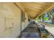Exterior shot of horse stalls, highlighting the covered walkway, durable concrete, and ample space at 2770 La Casita Ave, Las Vegas, NV 89120