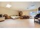 Spacious main bedroom features tile floors, large windows, and a ceiling fan at 2770 La Casita Ave, Las Vegas, NV 89120