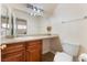 Bathroom features granite countertops and wooden cabinets at 309 Clifton Heights Dr, Las Vegas, NV 89145