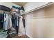 Walk-in closet featuring shelves and hanging rods for plenty of storage space at 309 Clifton Heights Dr, Las Vegas, NV 89145