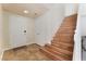 Entryway featuring tiled flooring, and a staircase leading to the upper level at 309 Clifton Heights Dr, Las Vegas, NV 89145