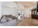 Bright living room featuring tile floors, a comfortable sectional sofa, and neutral walls, ready for relaxation and entertaining at 309 Clifton Heights Dr, Las Vegas, NV 89145