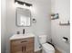 Stylish bathroom featuring modern vanity, sleek mirror, and updated fixtures at 323 Harpers Ferry Ave, Las Vegas, NV 89148