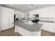 Spacious kitchen with granite countertops, stainless steel appliances, and a center island at 323 Harpers Ferry Ave, Las Vegas, NV 89148