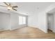 Bright living room with recessed lighting and wood-look flooring at 323 Harpers Ferry Ave, Las Vegas, NV 89148