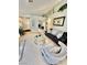 Bright living room with neutral tones, comfortable seating, and stylish decor at 3329 Hidden Ridge St, Las Vegas, NV 89129