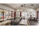 Spacious community room with large windows, tables and chairs for gatherings at 3425 E Russell Rd # 265, Las Vegas, NV 89120