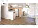 Bright and airy kitchen connected to dining and living area with wood floors at 3425 E Russell Rd # 265, Las Vegas, NV 89120
