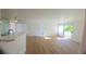 Bright living room with modern flooring, sliding glass doors and an open floor plan for easy entertaining at 3425 E Russell Rd # 265, Las Vegas, NV 89120