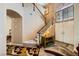 Spacious foyer with staircase, tile flooring, and a view of the upper level at 3624 Snowy Pines St, Las Vegas, NV 89147