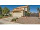 Well-kept home featuring a two-car garage and mature landscaping at 3624 Snowy Pines St, Las Vegas, NV 89147