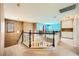 Hallway featuring a staircase, carpet flooring, and access to multiple rooms at 3624 Snowy Pines St, Las Vegas, NV 89147