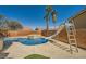 Sparkling pool and spa featuring a slide and surrounded by a patio, perfect for summer fun at 3624 Snowy Pines St, Las Vegas, NV 89147