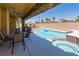 Outdoor space includes a built-in grill, hot tub, pool and a covered patio perfect for entertaining at 3738 Amber Lantern Cir, Las Vegas, NV 89147